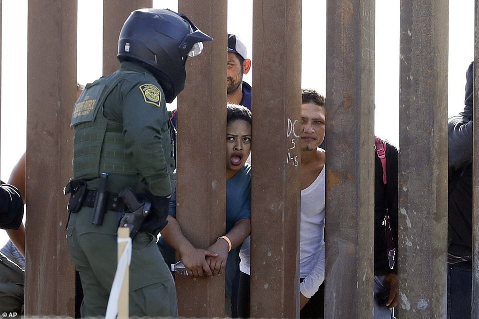 US border tear-gassing migrants